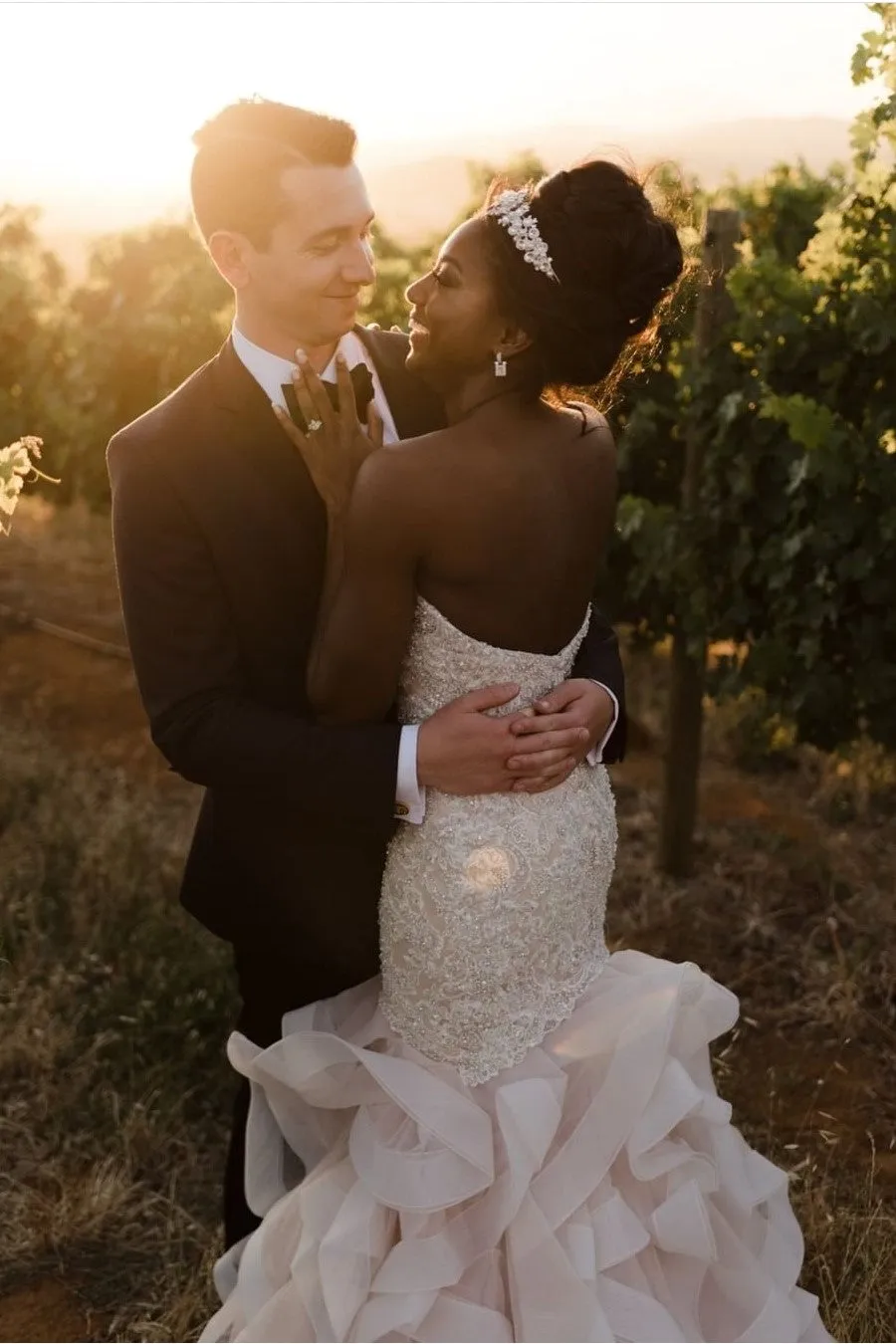 Whimsical Tiered Wedding Gown with Beaded Lace Corset